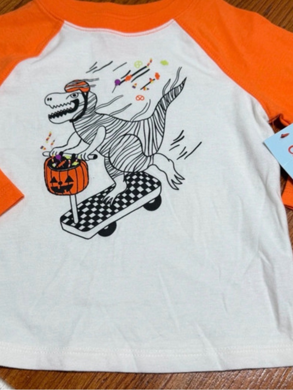 Kids Dinosaur Halloween candy skateboard shirt candy orange white baseball tee